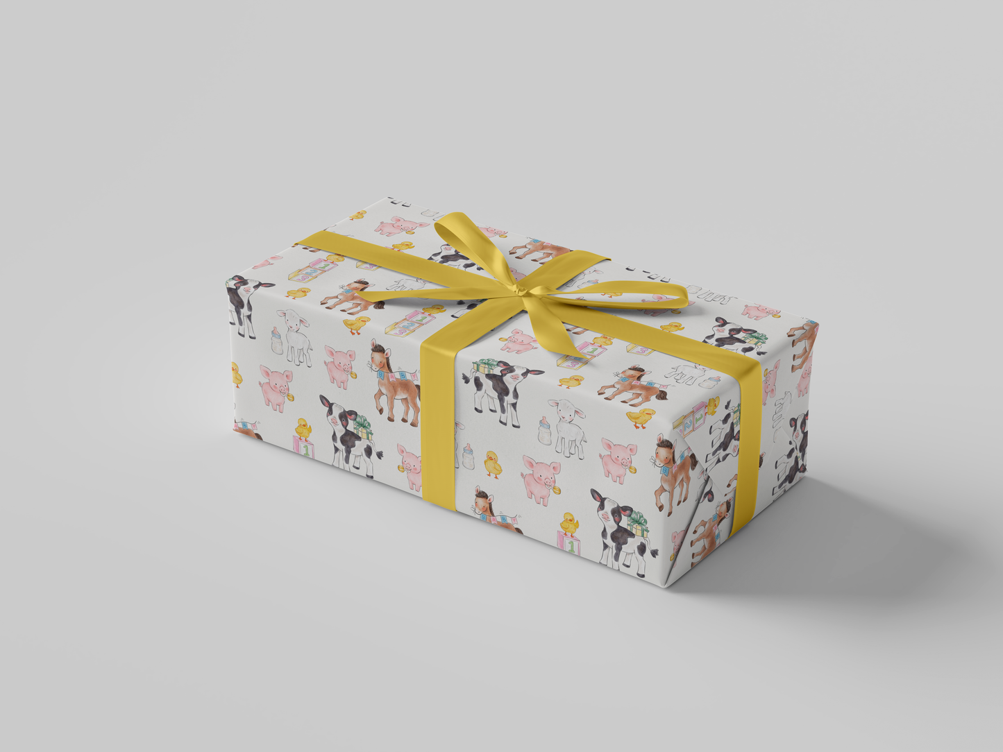 Side view of light cream wrapping paper featuring a whimsical pattern of baby farm animals, including cows, pigs, lambs, ducklings, and ponies, surrounded by baby bottles, gift boxes, and pastel alphabet blocks.