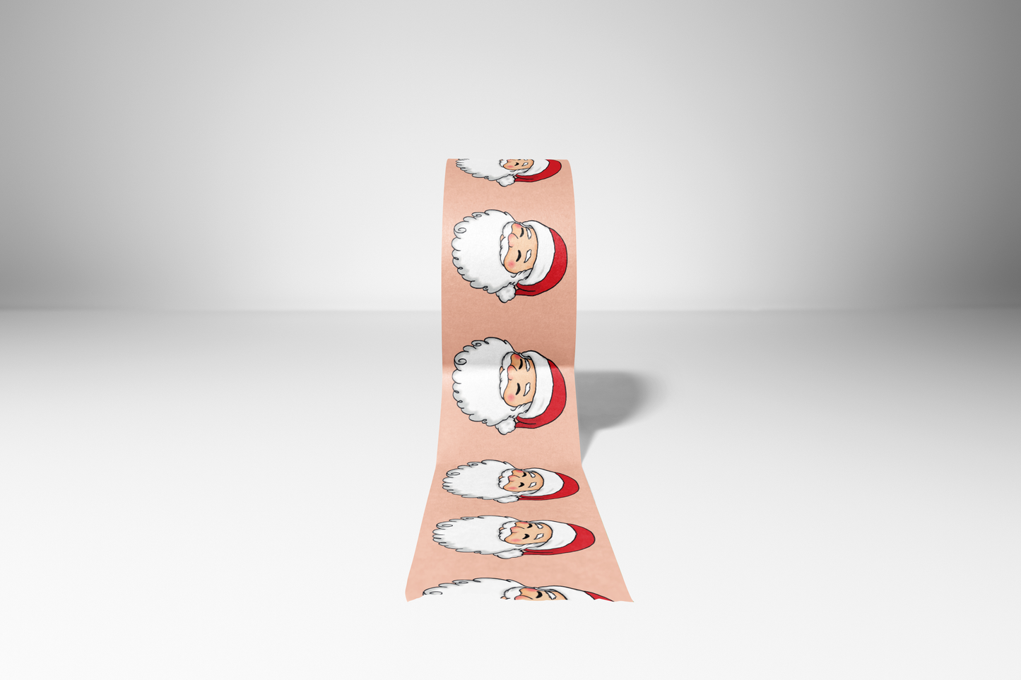 Decorative washi tape featuring a smiling Santa Claus wearing a red hat, set against a peach background.