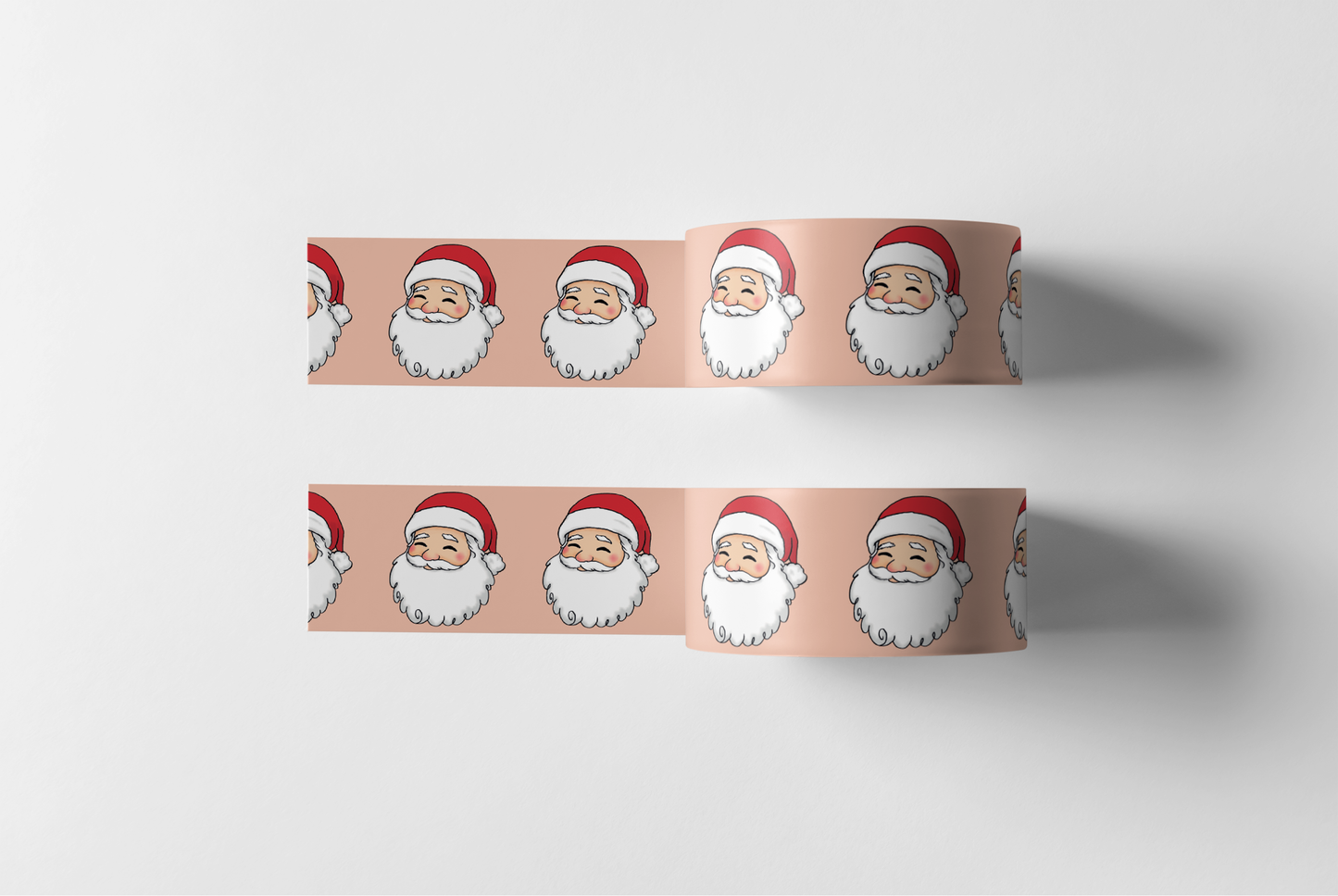 Two sets of decorative washi tape featuring a smiling Santa Claus wearing a red hat, set against a peach background.