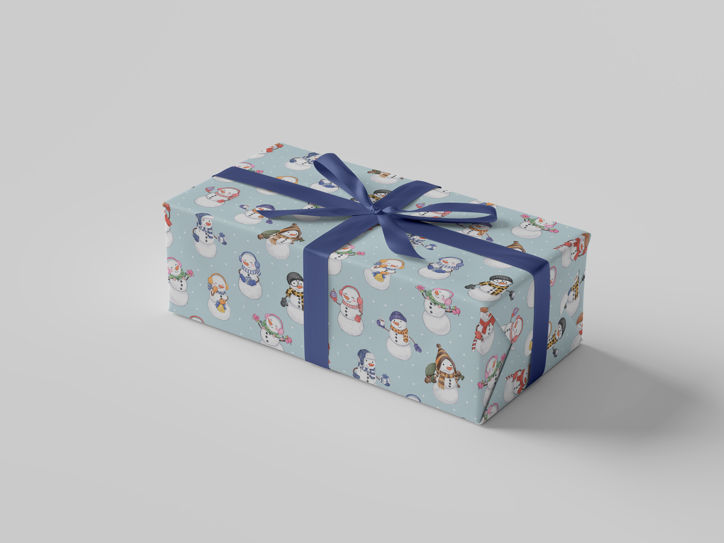 Side view of snowman and snowladies with Christmas lights, ornaments, coffee, presents, bag of gifts, bells, and snowballs posed against a backdrop of light blue-colored wrapping paper.