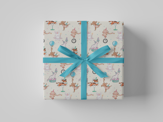 Front view of light cream wrapping paper featuring a whimsical pattern of circus animals, including monkeys doing handstands, bears on unicycles, bunnies with hula hoops, tigers jumping through hoops, and seals balancing gifts, all wearing party hats and decorated with scattered lavender and blue confetti polka dots.
